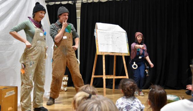 Artists performing in front of kids