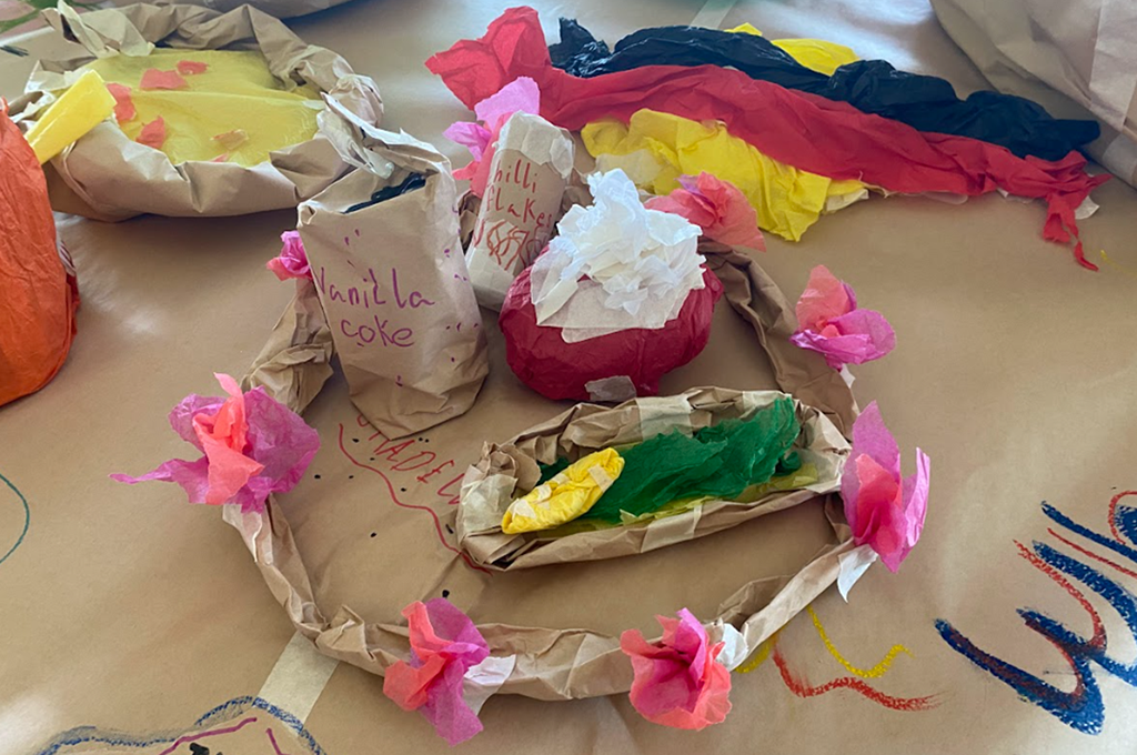 Polyglot & Rumbalara Kids Collaborations photo: Lexie Wood. Vanilla coke, chilli flakes and other food items made from parchment and coloured tissue paper.