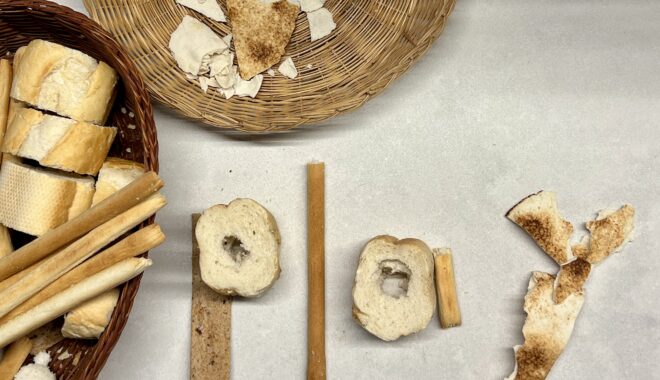 Photo: Lauren Swain. The word 'play' formed out of bread and crackers.