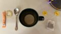 Photo: Lauren Swain. The word 'play' formed out of sugar, a teaspoon, mug and teabags.