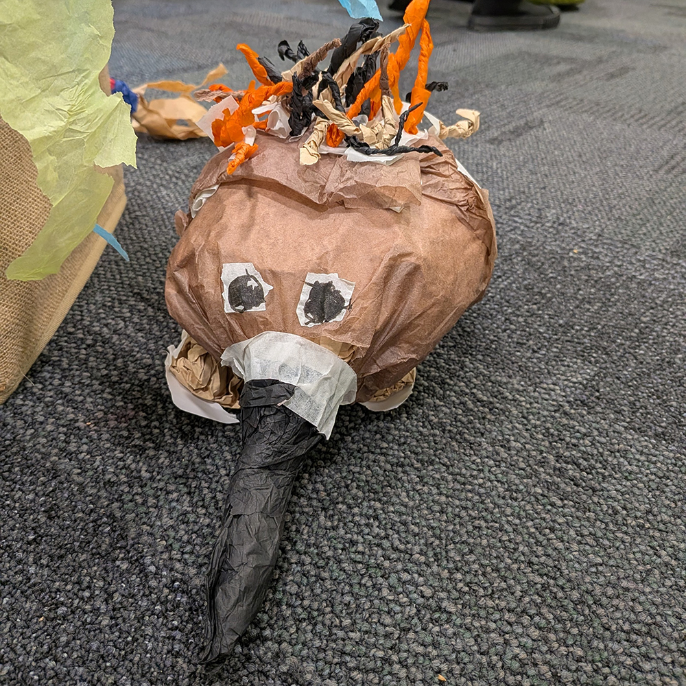 Voice of the Child photo. A handmade paper echidna.
